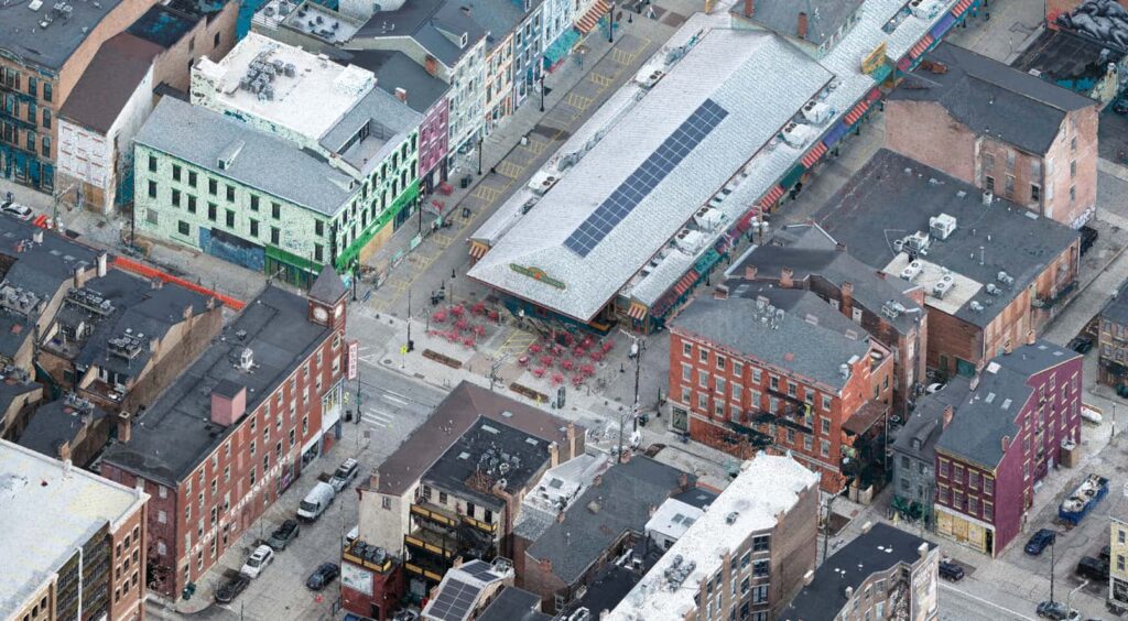 Oblique aerial photogrammetry model of city blocks with brick buildings
